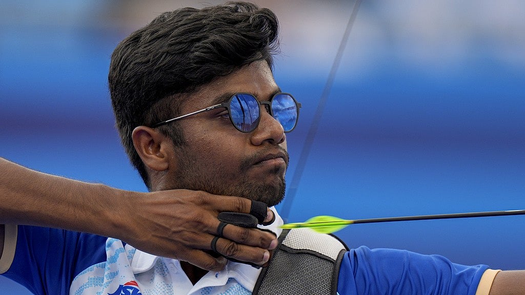 Photo: AP : India's Dhiraj Bommadevara in action during the recurve archery mixed team semi-final at Paris Olympic Games 2024 on Friday (August 2).  