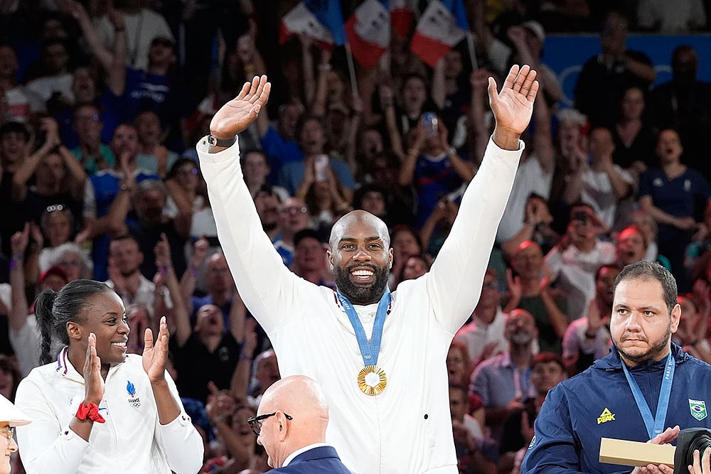 Photo: AP/Eugene Hoshiko : Paris Olympics Judo