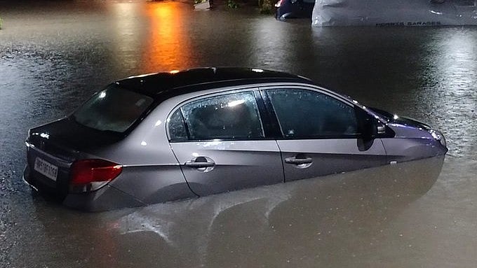Car submerged in water in Delhi amid heavy rains | - X/@sumedhasharma86