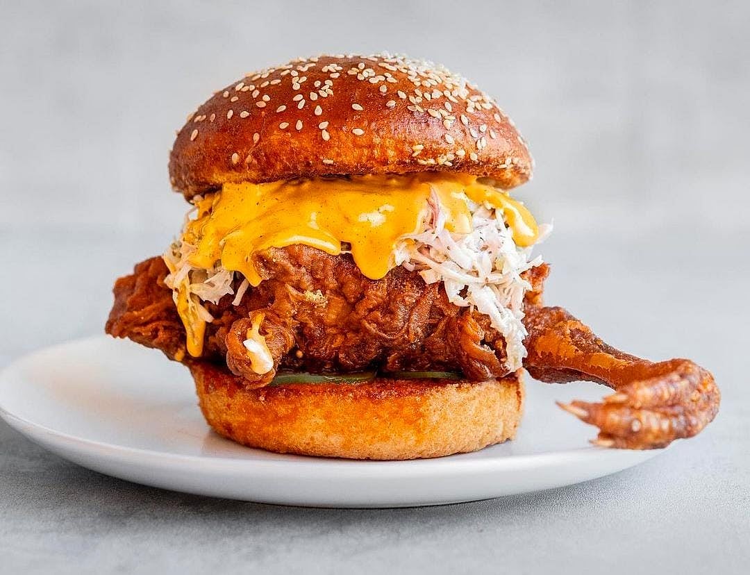 Chicken sandwich with a claw, claude the claw, birdbox chicken sandwich