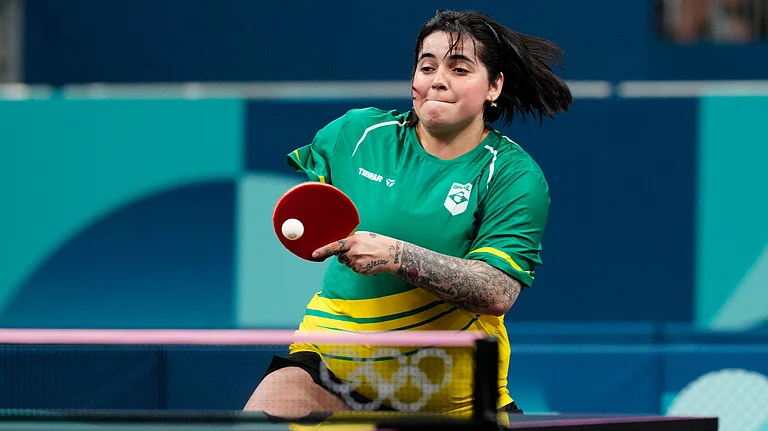 Brazil's Bruna Alexandre, with her teammate Giulia Takahashi, plays against South Korea's Shin Yubin and Jeon Jihee during a women's teams round of 16 table tennis match at the 2024 Summer Olympics, Monday, Aug. 5, 2024, in Paris, France. - AP Photo/Petros Giannakouris