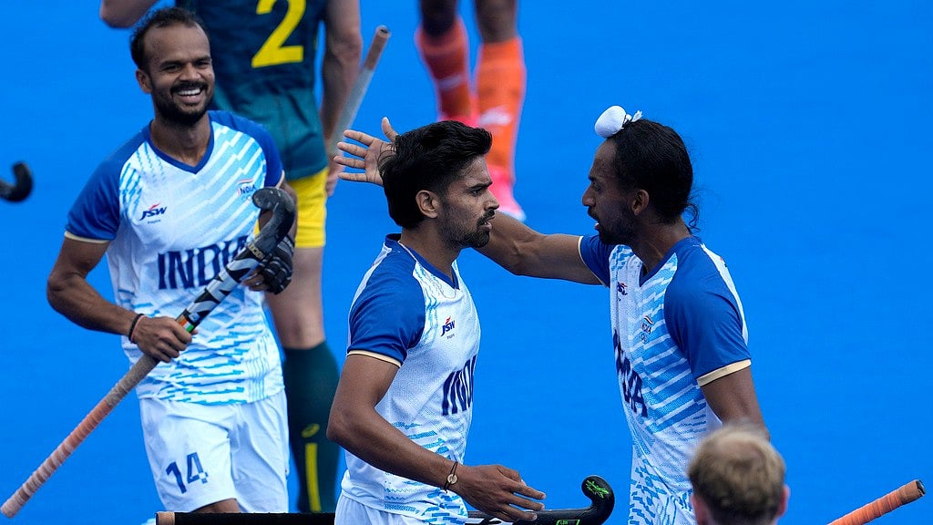Photo: AP : Abhishek (centre) celebrates with teammates after scoring India's first goal against Australia at the Paris Olympic Games 2024 on Friday (August 2).