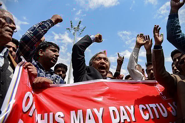 Leader of Communist party of India Mohd Yousuf Tarigami seen protesting