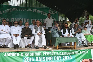 (Photo by Waseem Andrabi via Getty Images) : Peoples Democratic Party (PDP) president Mehbooba Mufti and other party leaders during a public rally on the 25th Foundation Day of the party on July 27, 2024 in Srinagar, India. Peoples Democratic Party (PDP) president Mehbooba Mufti challenged Home Minister Amit Shah to form a committee with 20 representatives from each side of the Line of Control in Kashmir. This committee would meet biannually to discuss and address important regional issues.