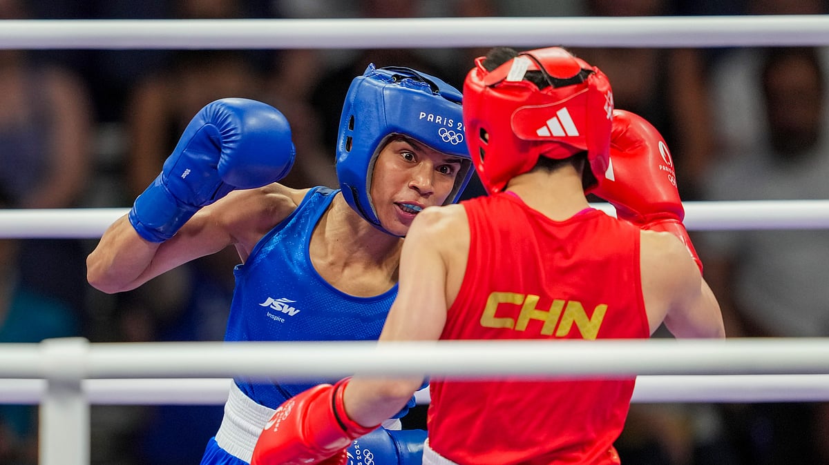 PTI Photo/Ravi Choudhary : India's Nikhat Zareen (in blue) and China's Wu Yu during their women's 50kg Round of 16 boxing match at the 2024 Summer Olympics, in Paris.