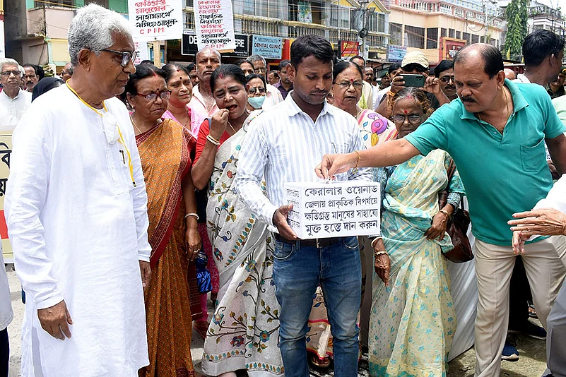 Money collection for Kerala landslide victims in Agartala.