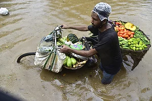 Photo: PTI : Weather: Heavy rainfall in Guwahati
