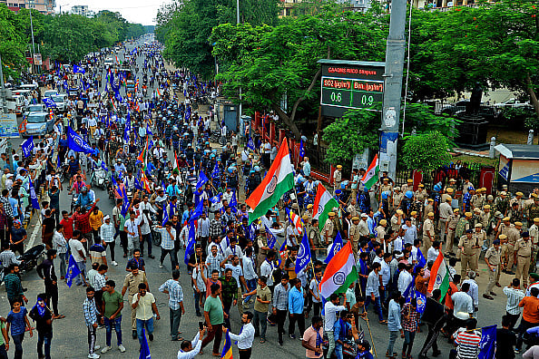 Getty Images : Bhim Sena activists hold a protest rally against the Supreme Court's August 1 decision on the issue of SC-ST reservation