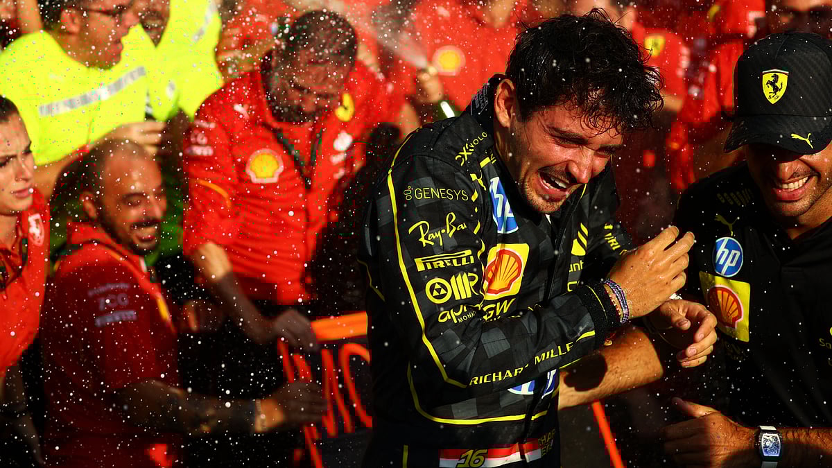 Charles Leclerc celebrates his victory at the Italian Grand Prix