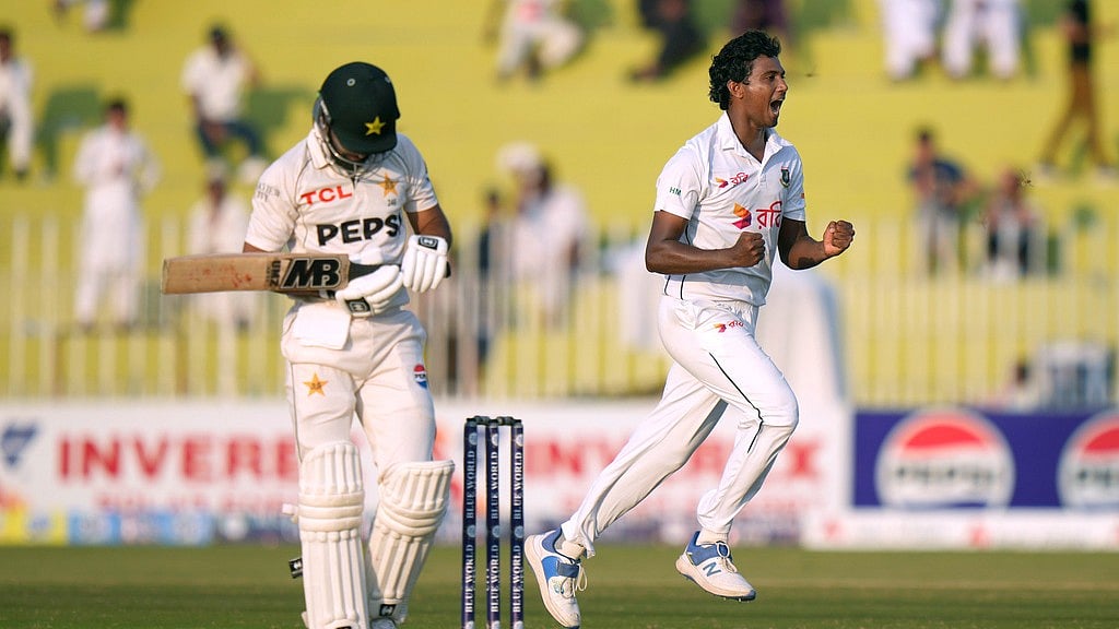 AP/Anjum Naveed : Hasan Mahmud, right, celebrates after taking the wicket of Abdullah Shafique, on the third day of second Test between Pakistan and Bangladesh in Rawalpindi.