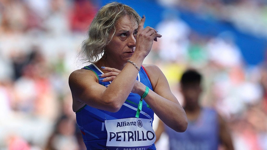 AP/Jackson Ranger : Italy's Valentina Petrillo prepares to compete in the women's 400m T12 round 1 at the Stade de France Stadium, during the 2024 Paralympics on Monday (September 2).