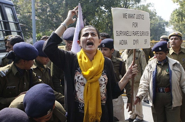 Getty Images : Members of All India Democratic Women's Association (AIDWA), Democratic Youth Federation of India (DYFI) and SFI protesting over Suryanelli rape case, near Parliament.