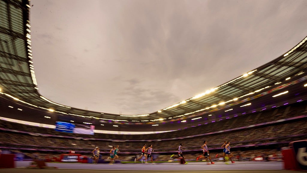 AP/Emilio Morenatti : Athletes at the Stade de Fance in 2024 Paralympics.