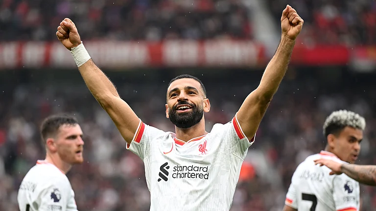 Mohamed Salah celebrates after scoring versus Manchester United - null
