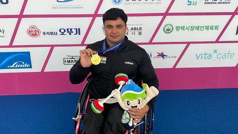 X : Para powerlifter Ashok Malik in action in the final