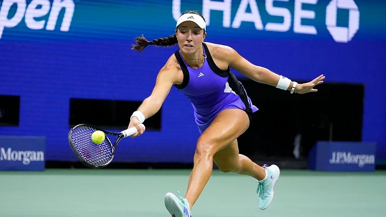 Jessica Pegula returns to Karolina Muchova during their US Open 2024 women's singles semi-final match on Friday (September 6).  - AP/Kirsty Wigglesworth