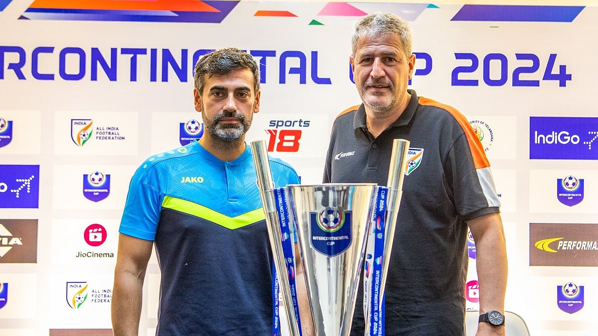 X/IndianFootball : India and Syria coaches with the Intercontinental Cup 2024 trophy.