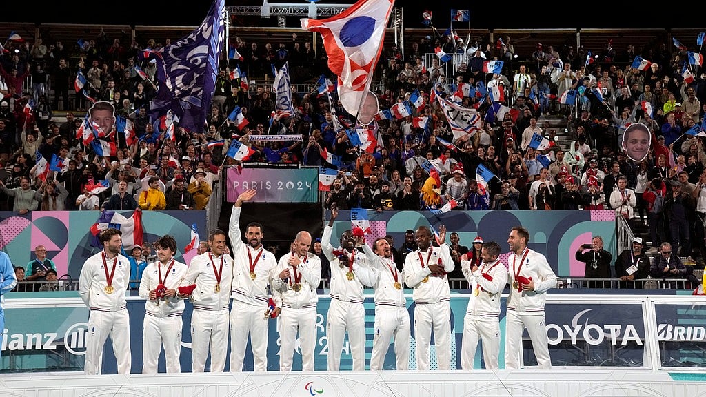 AP/Christophe Ena : France players celebrate winning the blind football gold medal match at the 2024 Paralympics, Saturday, Sept. 7, 2024.