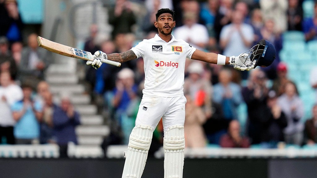 Sri Lanka's Pathum Nissanka celebrates his century on day four of the third Test against England at The Oval. - AP/John Walton