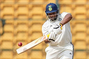 Photo: PTI/Shailendra Bhojak : Sarfaraz Khan.