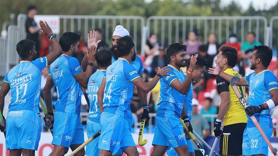 Indian hockey team celebrating 8-1 victory over Malaysia. - X/@asia_hockey