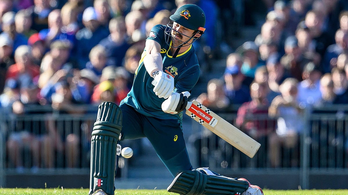 Malcolm Mackenzie/AP : Australia's Travis Head hits a four during the first T20 International Series Cricket match in Edinburgh, Scotland