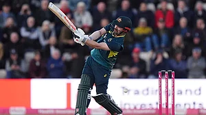 | Photo: Bradley Collyer/PA via AP : England vs Australia 1st T20I: Australia's Travis Head bats against England