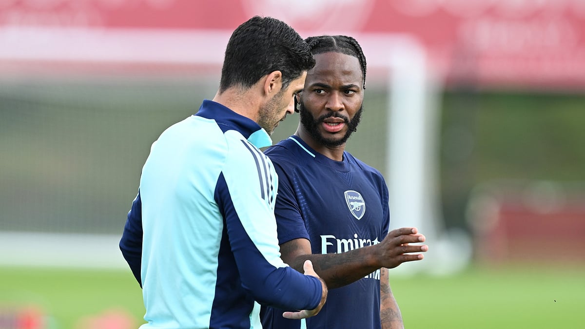 Mikel Arteta and Raheem Sterling