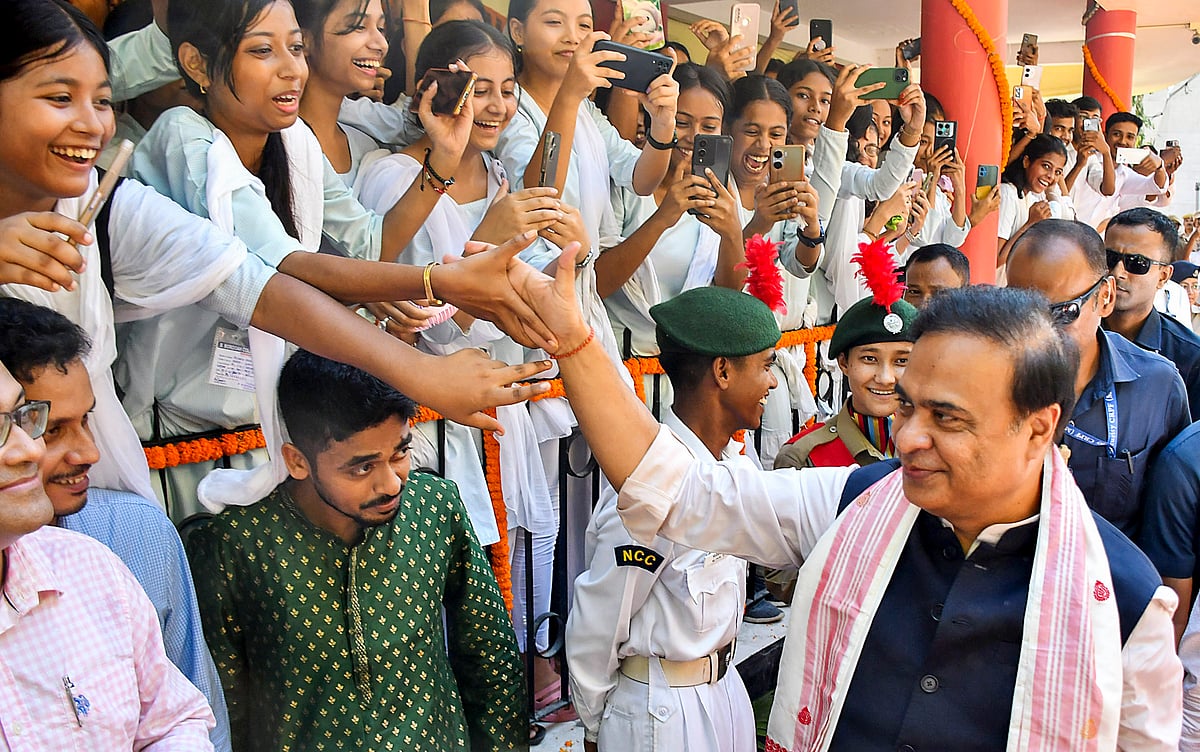 PTI : Assam Chief Minister Himanta Biswa Sarma being greeted by students as he arrives to attend the foundation day celebration of B. Borooah College in Guwahati.
