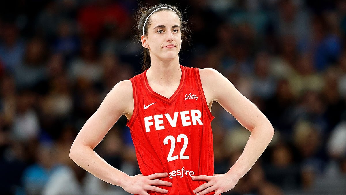 Caitlin Clark #22 of the Indiana Fever looks on against the Minnesota Lynx in the first quarter at Target Center on July 14, 2024 in Minneapolis, Minnesota.