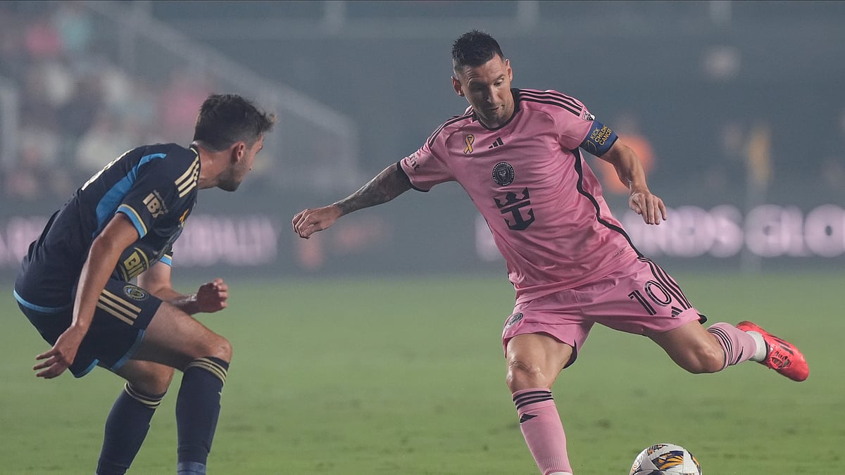 Inter Miami forward Lionel Messi (10) kicks the ball away from Philadelphia Union midfielder Leon Flach (31) during the first half of an MLS match. - AP Photo/Marta Lavandier