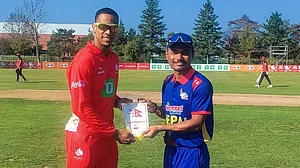 X/CricketNep : Nepal and Canada cricket team captains at the toss.