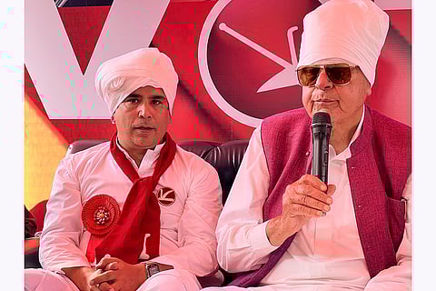 J&K Assembly Polls: J&K National Conference President Farooq Abdullah with party candidate Tanvir Sadiq during a rally