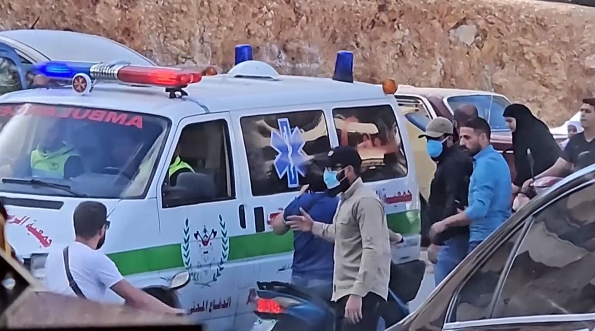 Ambulance arrives at the scene after explosion. - Screengrab from AP