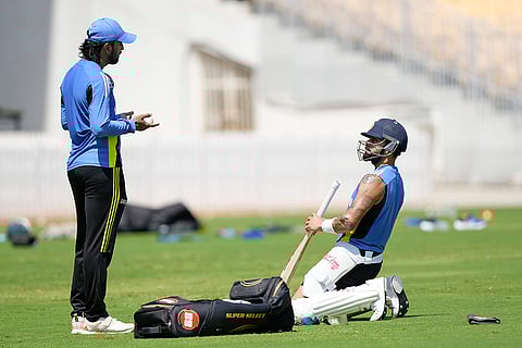 India vs Bangladesh Cricket: K L Rahul gestures with Virat Kohli during a training session