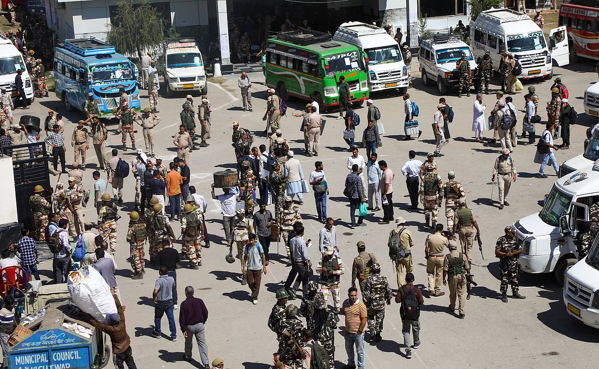 Polling officials with security personnel leave for their respective polling stations on the eve of first phase of the Jammu and Kashmir Assembly election, in Kishtwar district, Tuesday, Sept. 17, 2024. - PTI