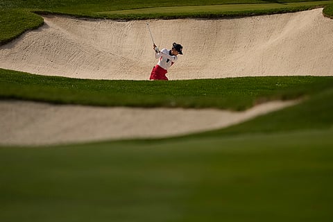 Solheim Cup Golf, United States vs Europe: United States' Rose Zhang hits from a bunker of the seventh fairway