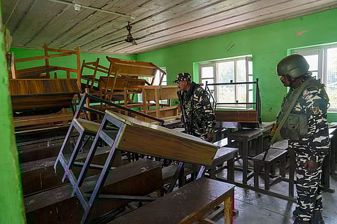 J&K Polls 2024, South Kashmir: Security personnel make arrangements at a polling station