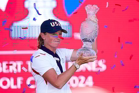 Solheim Cup Golf, United States vs Europe: United States Captain Stacy Lewis lifts the winner's trophy