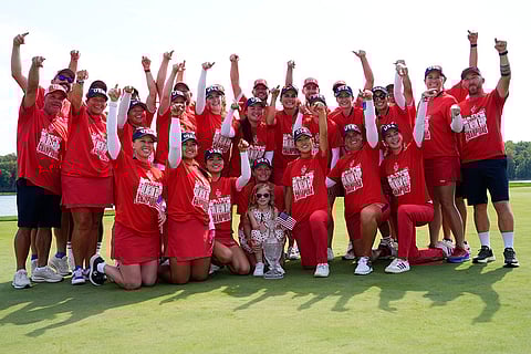 Solheim Cup Golf, United States vs Europe: United States players poses for photographs after the United States won the Solheim Cup golf tournament