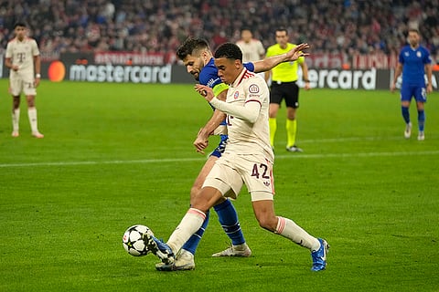Champions League 2024-25, Bayern Munich vs GNK Dinamo: Bayern's Jamal Musiala, (42), is tackled by Dinamo's Bruno Petkovic