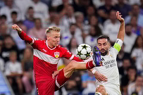 Champions League 2024-25, Real Madrid vs VfB Stuttgart: Stuttgart's Chris Fuehrich, left, vies for the ball with Real Madrid's Dani Carvajal