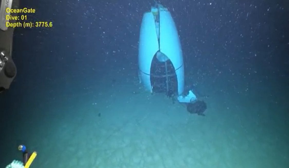 X/@Morbidful : Tail of the OceanGate Titan submersible seen on the ocean floor in new footage | 