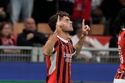 Champions League 2024-25, AC Milan and Liverpool: AC Milan's Christian Pulisic celebrates scoring his side's opening goal