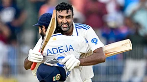 Ravichandran Ashwin celebrates his century with Ravindra Jadeja