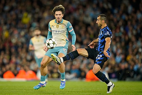 UEFA Champions League, Manchester City vs Inter Milan: Inter Milan's Henrikh Mkhitaryan, right, controls the ball past Manchester City's Jack Grealish