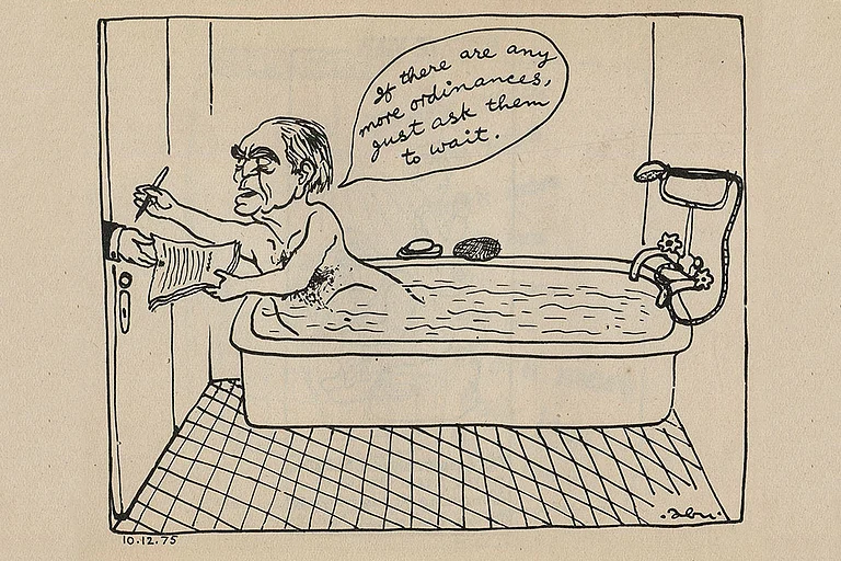 Iconic Image: Abu Abraham’s cartoon of then President Fakhruddin Ali Ahmed signing the Emergency declaration - null