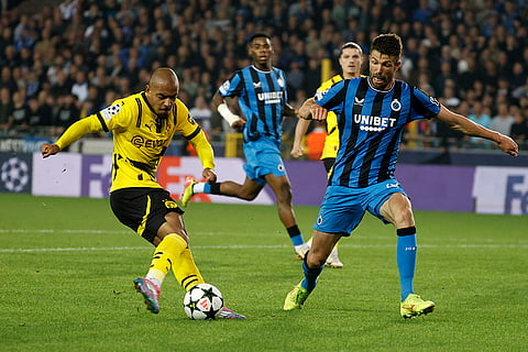 UEFA Champions League, Club Brugge vs Borussia Dortmund: Dortmund's Donyell Malen and Brugge's Brandon Mechele challenge for the ball
