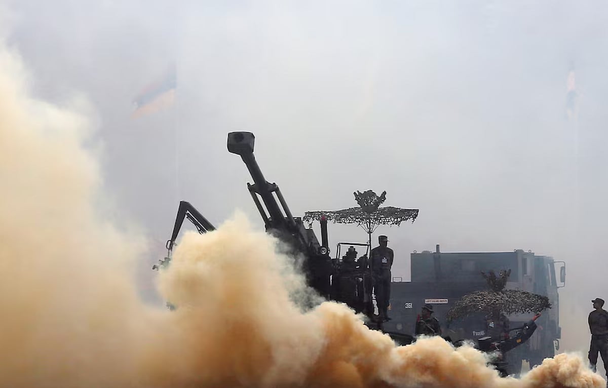 Indian Army soldiers participate in a mock drill exercise during the Army Day parade in New Delhi. - Reuters