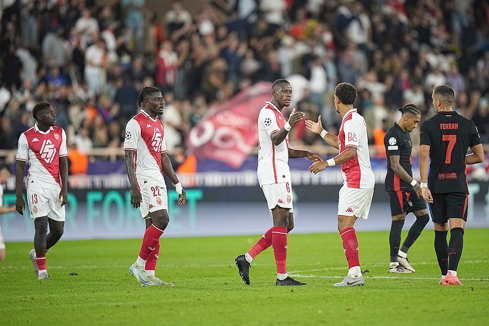 | Photo: AP/Laurent Cipriani : UEFA Champions League, Monaco and Barcelona: Monaco players celebrate at the end of the match